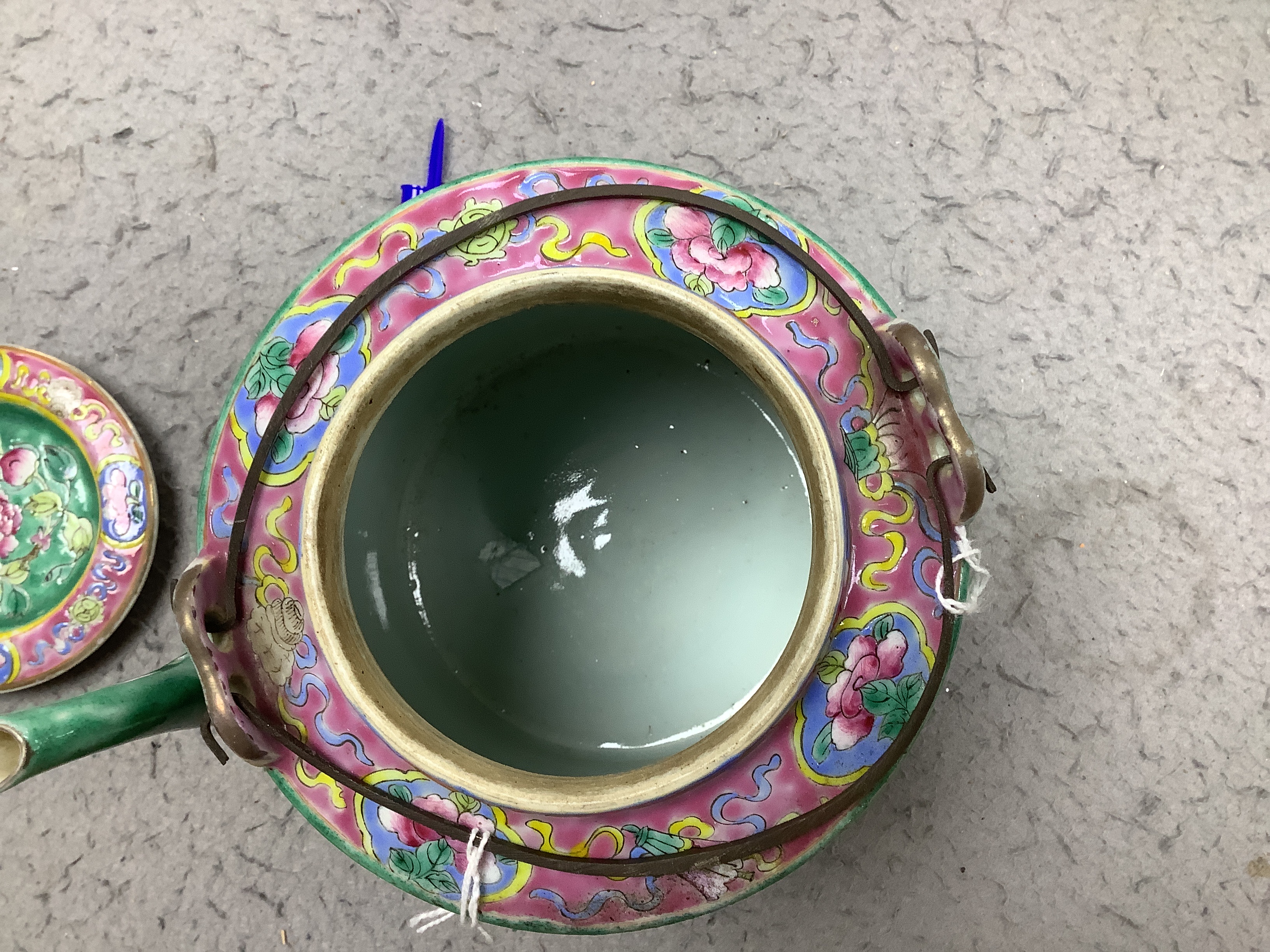A Chinese Straits enamelled porcelain teapot and cover and seven similar tea bowls, Guangxu period and a pillow, teapot 18cm high including cover